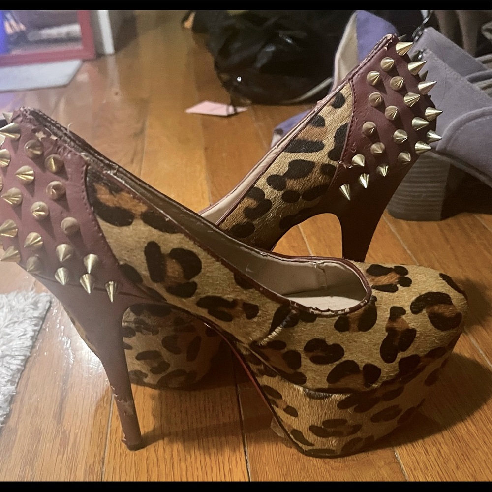 Betsey Johnson …Cheetah print with burgundy Tim and gold spike heels